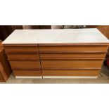 A Twenty 4 teak and white melamine four-drawer chest of drawers (84cm x 43cm x 66cm high) and a