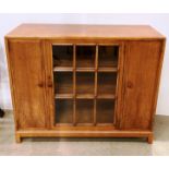 Mid-Century Heal & Sons of London walnut three-door side cabinet with centre tracery glass door
