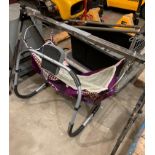 Chrome and black metal framed hanging baby cradle and an exercise frame (saleroom location: MA4)