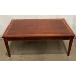 Two-tone mahogany inlaid coffee table on tapered legs - 112 x 61 x 48cm high (saleroom location: