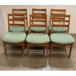 Set of six light oak ladder-back dining chairs with green and blue upholstered seat (saleroom