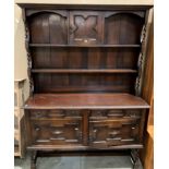 Solid oak farmhouse dresser with single central door,