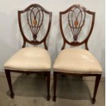 Pair of mahogany inlaid shield back dining chairs with ivory coloured upholstered seat (saleroom