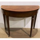 Mahogany and satin wood banded folding side/card table with ebony inlay on tapered squared legs and