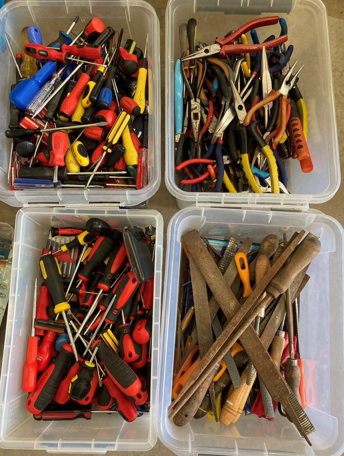 Contents to four boxes - a large quantity of assorted screwdrivers, pliers, flies etc.