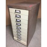 A Bisley ten drawer brown and cream stationery cabinet 59cm high x 41 x 28 (one drawer missing