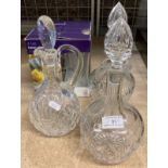 Three glass decanters with stoppers and a set of four tall beer glasses (4) (saleroom location: