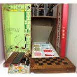 Box containing five items including chess board box containing chess pieces,