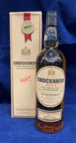 A 75cl bottle of 1977 Knockando pure single malt whisky (40% volume) in presentation box (saleroom