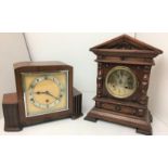 Two wooden framed mantel clocks - one 23cm high with Garrard movement and the other 33cm high -