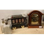 Two items - a battery operated mantel clock with brass finish face and a two bottle decanter set in