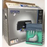 Two items with boxes: Epson Expression Home XP-405 printer and Workspace: Gear computer vac with