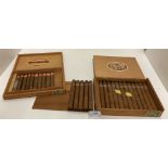 A wood box containing seventeen Flos de Jamaica cigars and a wood box containing ten Jamavana