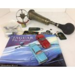 Contents to tray - ten plus items mainly Jaguar related including Lucas no 60 King of the Road