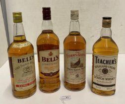 Four bottles of Scotch Whisky - a one litre bottle of Bell's Finest Old Scotch Whisky aged eight