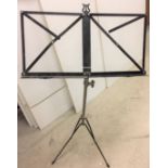 Metal folding and adjustable music/display stand extends up to one metre high (saleroom location: