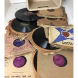 Beige plastic box containing 78rpm records - Peer Gynt, Lonnie Donegan, Andrews Sisters,