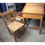 Childs wooden desk 49 x 40 x 72 cm high max and matching child's chair (saleroom location S1 QA09