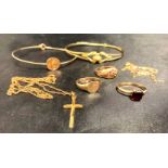 A selection of gold items - two 9ct gold bangles, one with St Christopher,