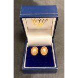 A pair of faux pearl and gold-plated (possibly) earrings without backs (boxed) (saleroom location: