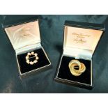 Two 9ct gold brooches - one with ivory-coloured pearls and the other a G-knot brooch,
