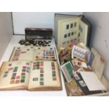 Box, lid and contents including three stamp albums,