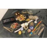 A selection of costume jewellery including a box of pearl earrings,