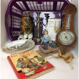 Purple wash basket containing three arm candelabra, wall mounted aneroid barometer,