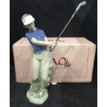 Nao figurine of male golfer,