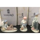 Three Lladro Golfino (guttersnipe) figurines with boxes - Plantado 22cm high,