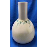 Pale yellow and white Ruskin 1919 vase with grape vine design,