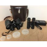 Two pairs of binoculars - Yashica 10x50 with leather case and Praktica 10x25S pocket binoculars