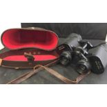 Pair of Boots 10x50 Coated Optics binoculars with leather case (saleroom location S3 QC16)