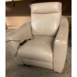 A beige leather electric recliner armchair (saleroom location: P0)