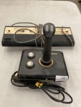 A Video Master Super Score vintage video game and a Gravis computer game joy stick (saleroom