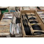 Contents to two boxes - approximately 400 assorted 45rpm singles (many without sleeves),