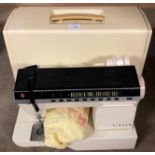 Singer Futura electric foot operated sewing machine model: 1000 in carrying case (saleroom