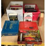 Contents to part of rack - two boxes of assorted books including Jungle Warfare,