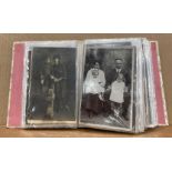 An album containing 114 postcards - mainly related to children (saleroom location: S3 T7)