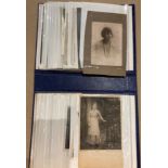 An album containing 54 'glamour' postcards and photographs (saleroom location: S3 T7)