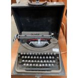 An Oliver manual typewriter in portable case (saleroom location: MA5)