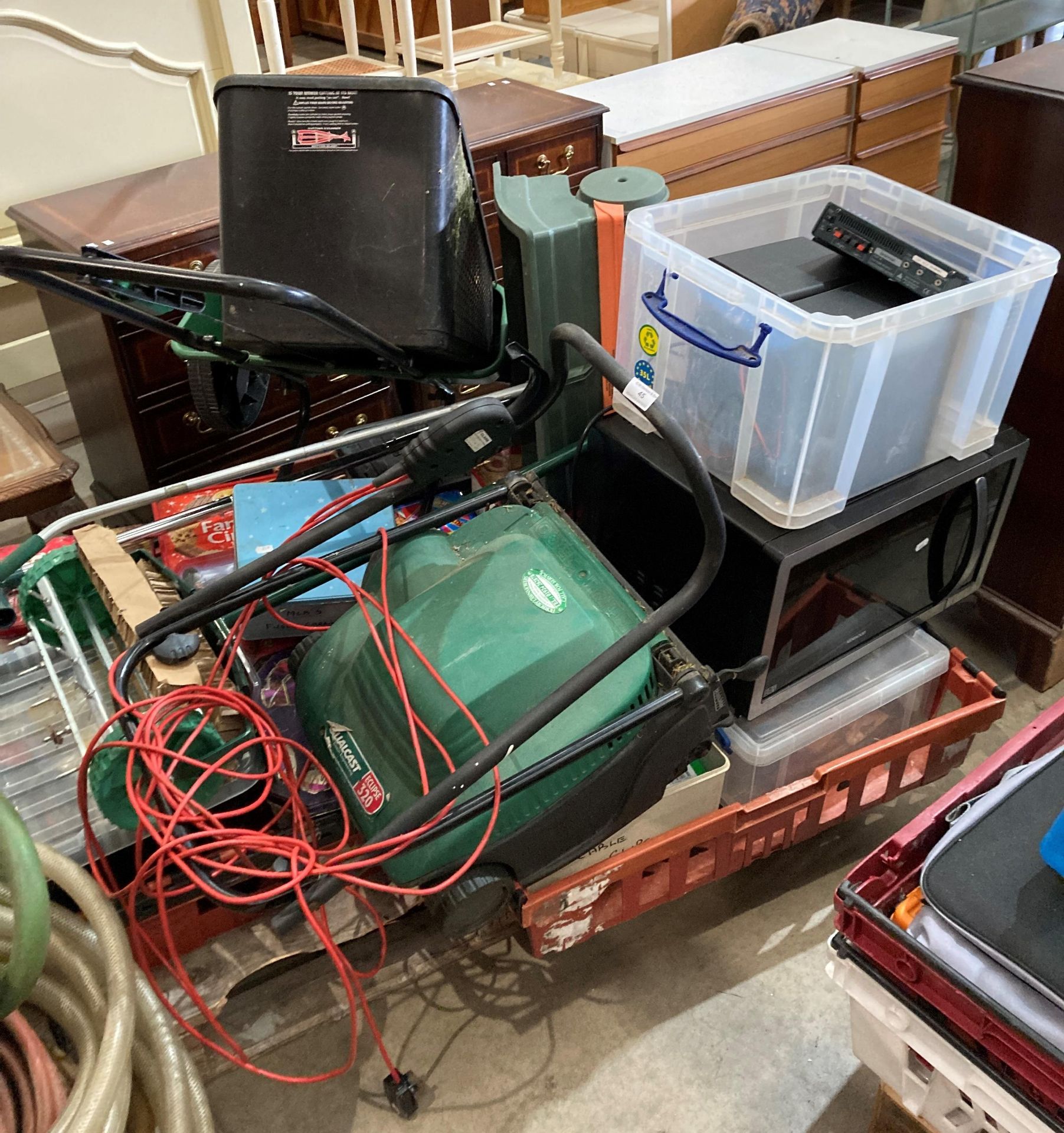 Contents to pallet - Kenwood microwave, 240v lawn mower, two scarifiers, seeder,