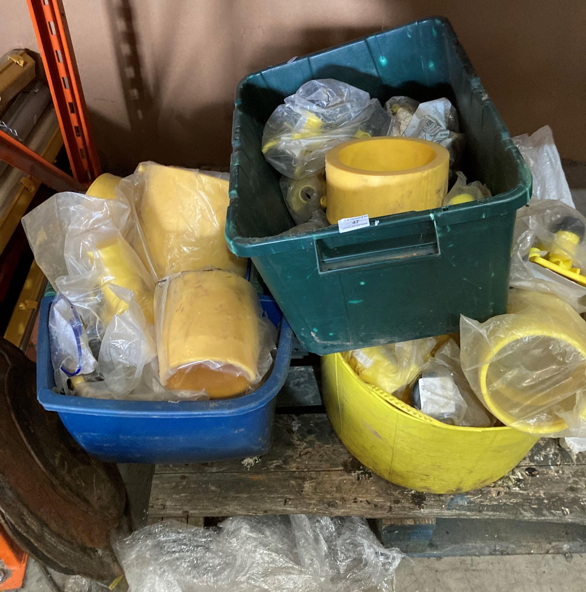 Contents to three tubs and crates - assorted yellow plastic pipe fittings and valves (saleroom