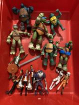 Contents to tray - twelve assorted action figures including five Ninja Turtles 2005/2012/2013,