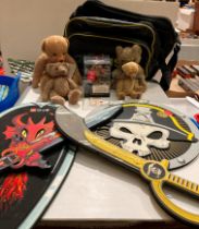 Contents to part of table - a used retro Adidas bag, Lego foam sword and shields,