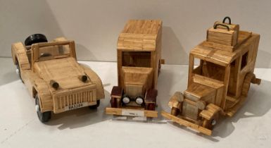 Three handmade wooden vintage vehicles including one van,