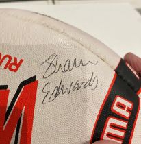 A signed Wigan Rubgy League FC rugby ball circa early 1990s - signatures include Shaun Edwards,