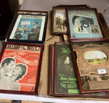 Contents to tray and next to tray - eleven small framed film and musical posters (Saleroom