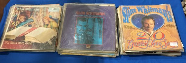 Thirty-two Slim Whitman albums,