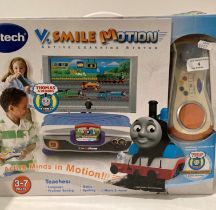 VTech V Smile Motion Active Learning System complete with seven assorted learning games (saleroom